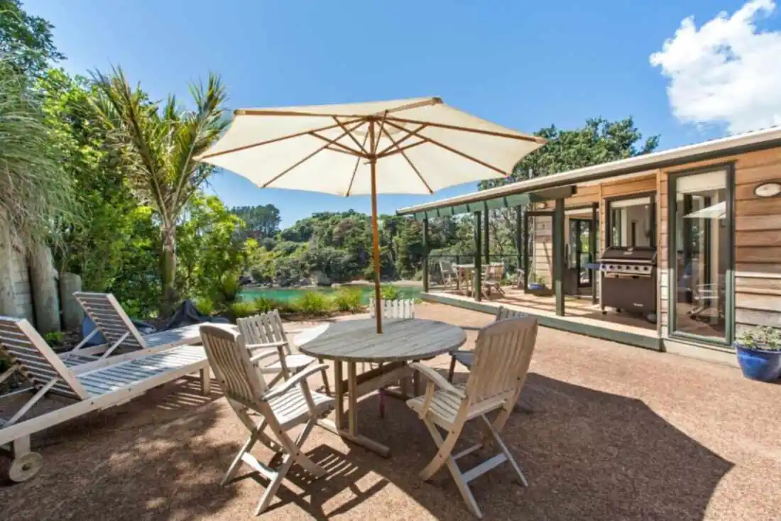 Beachfront Enclosure Bay terrace with sea views on Waiheke Island